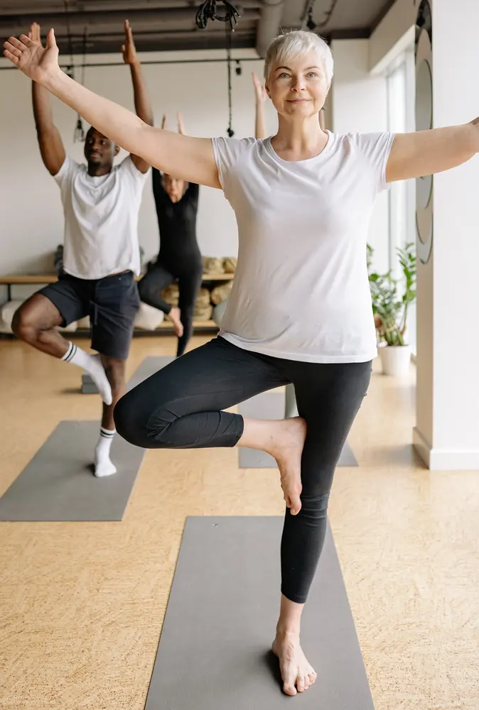 woman practising tree pose